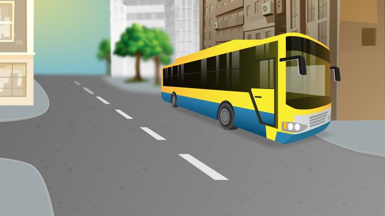 Yellow and blue bus on the right side of a street lined with buildings.