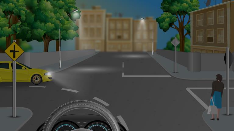Darkened view of a junction, a yellow car on the left and a pedestrian stepping from the right pavement.