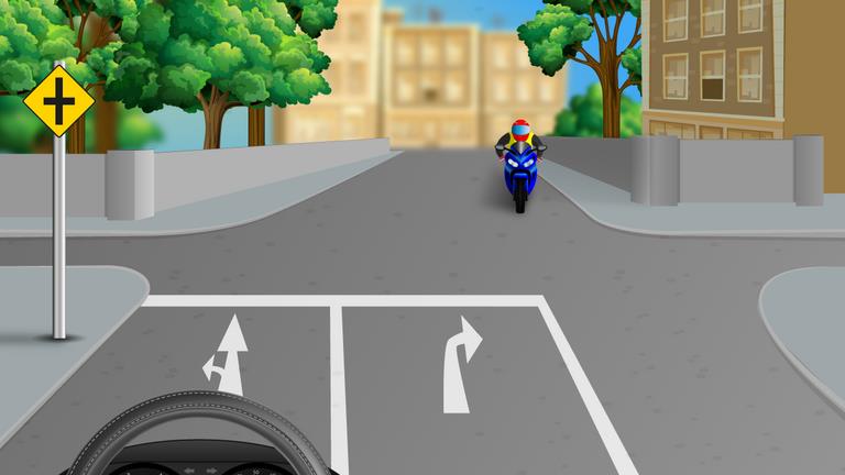 Driver's view at a junction with painted straight and right-turn lane arrows and a motorcycle opposite.