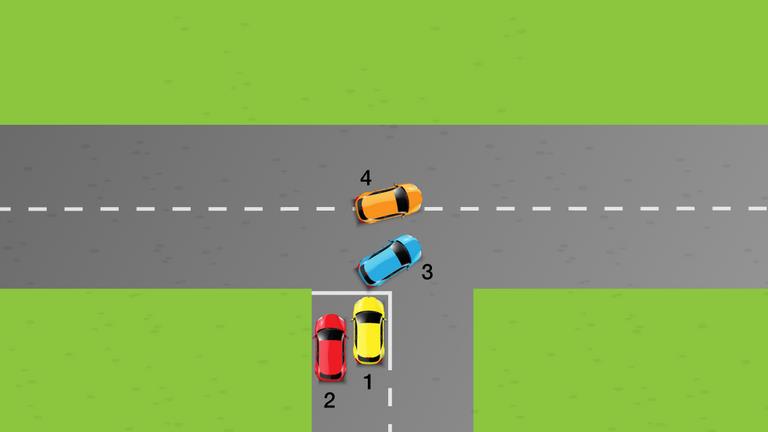 Overhead junction diagram with numbered colored cars; a vertical side road meets a horizontal road.
