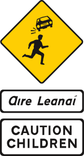Yellow diamond with a running child and car symbol; plates below read CAUTION CHILDREN and Irish wording.