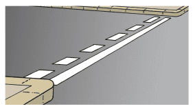 Road entrance with a continuous white line alongside a row of rectangular white marks.