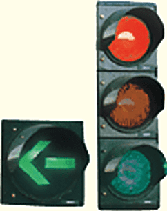 Traffic lights showing red, with an additional illuminated green left-pointing arrow beside the bottom lamp.